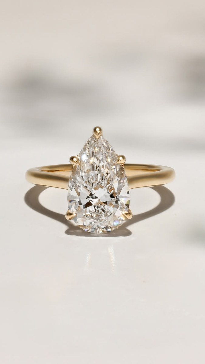 Pear-cut diamond solitaire engagement ring